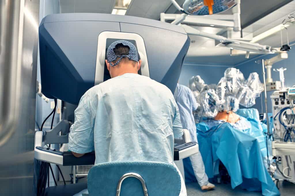 surgeon operating surgical robot